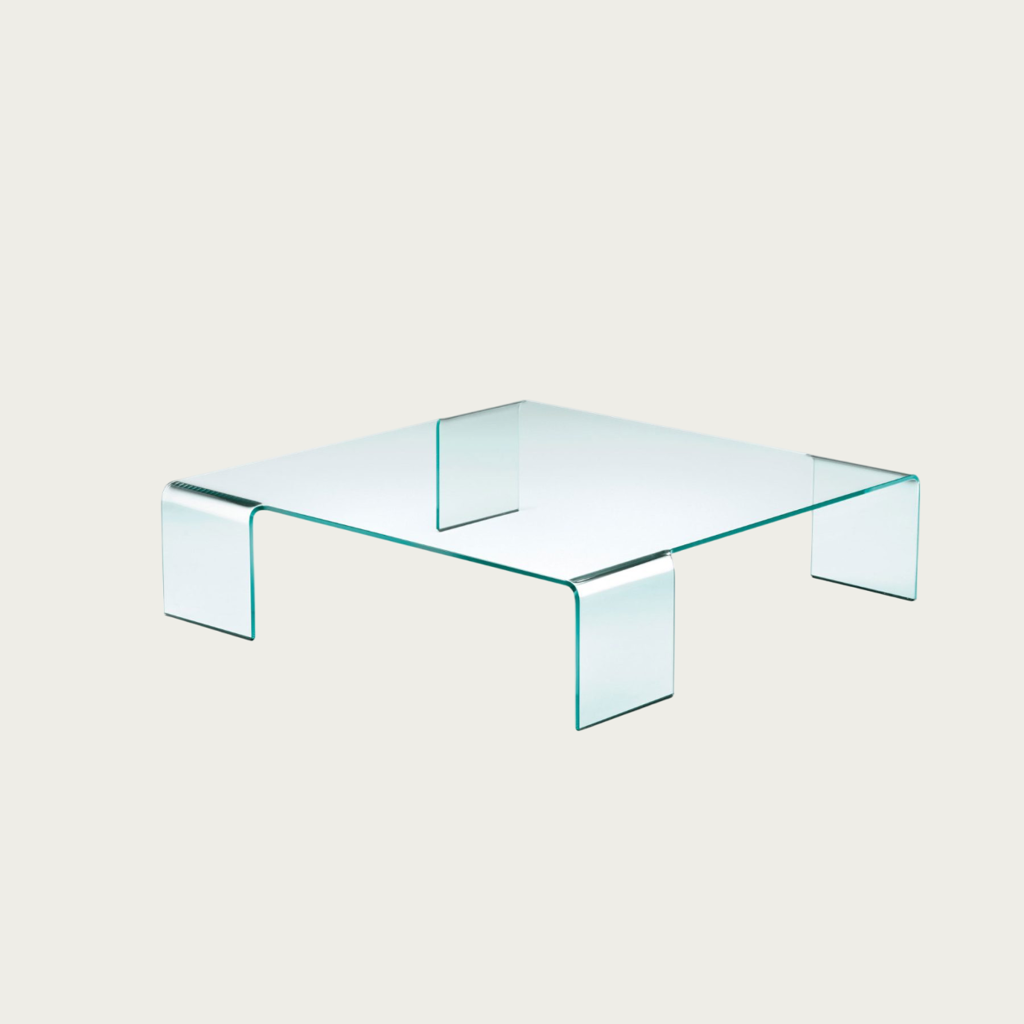 Découvrez la table Neutra de Fiam, design en verre trempé extra‑clair par Fiam Italia Studio. Disponible chez Maison Pruilh à Bordeaux.